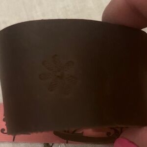 Leather floral imprinted cuff